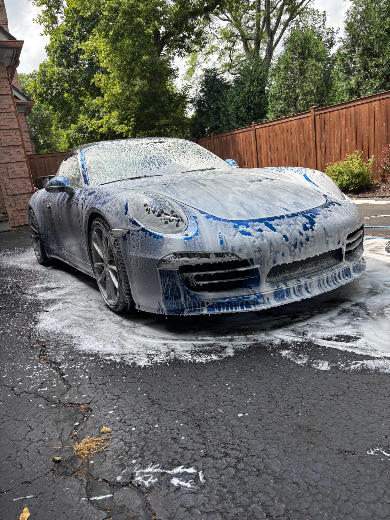 Porsche 911 covered in foam during exterior wash